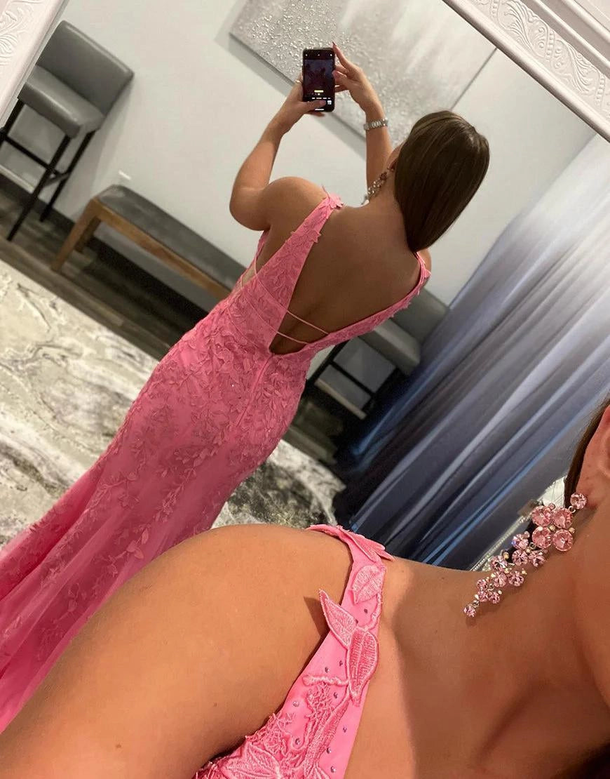 Red one-shoulder mermaid gown with glitter and open back.