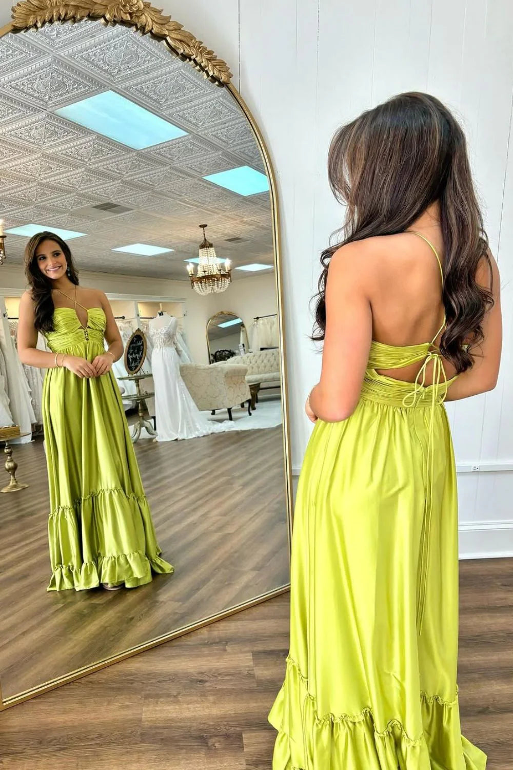 Elegant yellow satin A-line prom dress with spaghetti straps.
