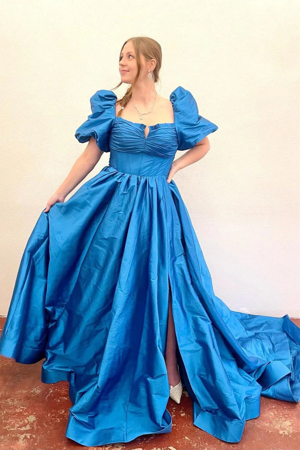 Close-up of sweetheart neckline, short sleeves, and corset bodice.