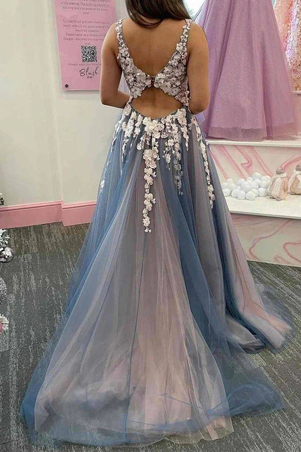 Full view of the A-Line tulle prom dress featuring a V-neck and intricate appliques.
