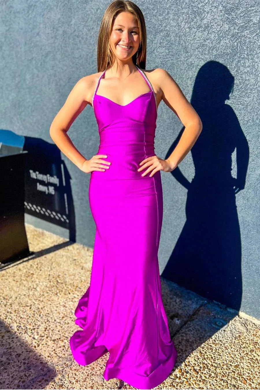 Front view of a royal blue mermaid gown, perfect for special occasions.