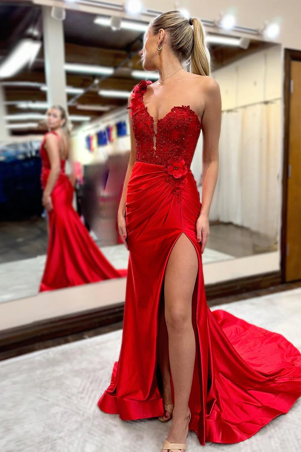 Elegant red mermaid prom dress with one shoulder and beaded appliques.