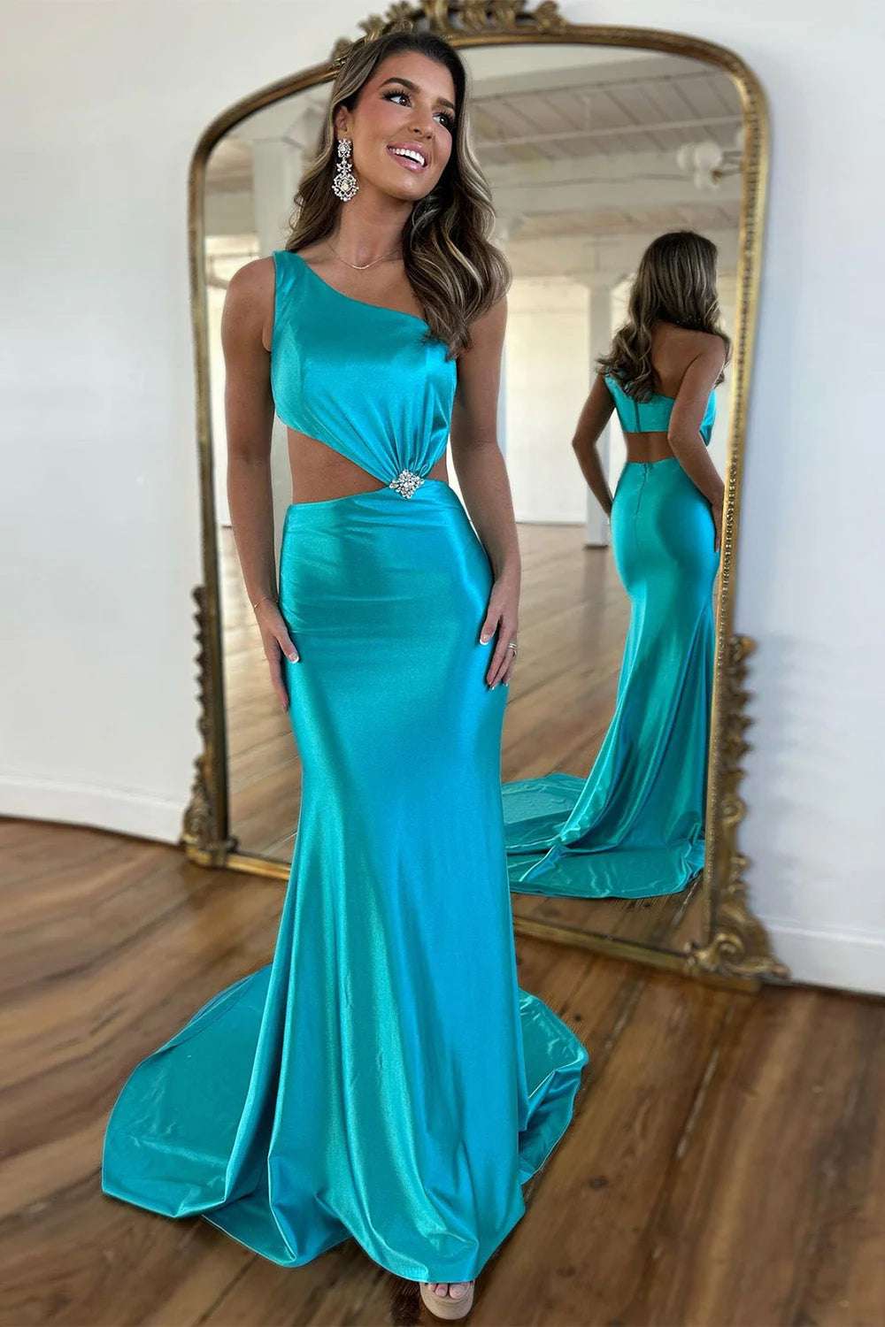 Lake blue mermaid prom dress with one shoulder, cutout, beading, and train.