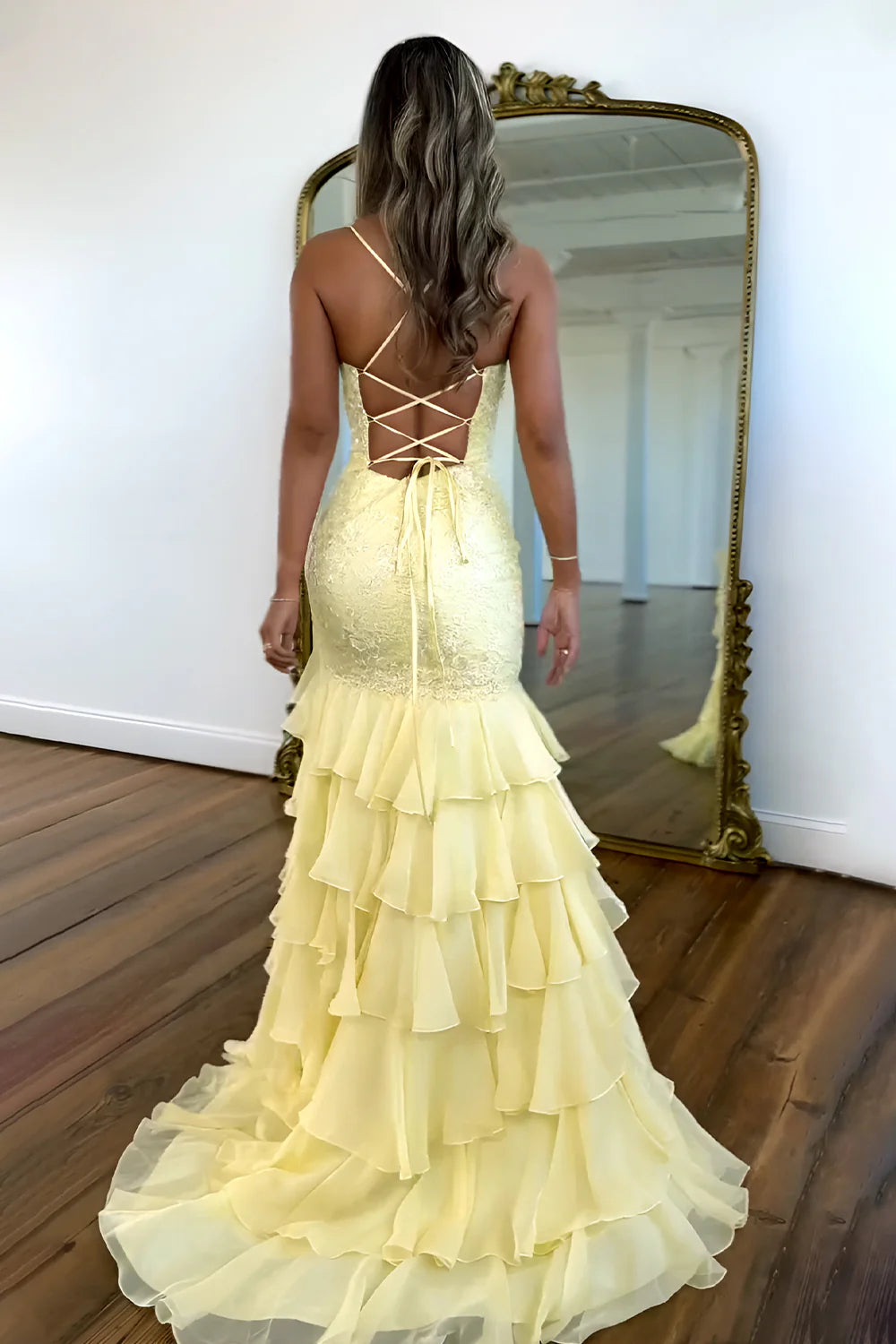 Front view of a lilac mermaid prom dress with ruffle lace and spaghetti straps.