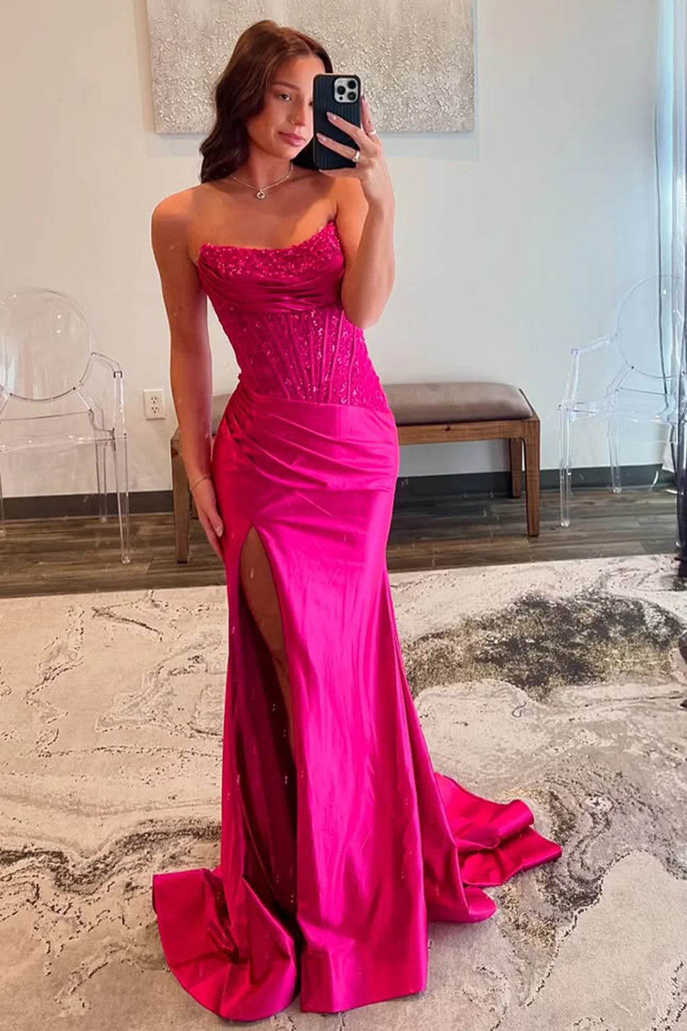 Elegant fuchsia mermaid prom dress with strapless lace top and thigh-high slit.
