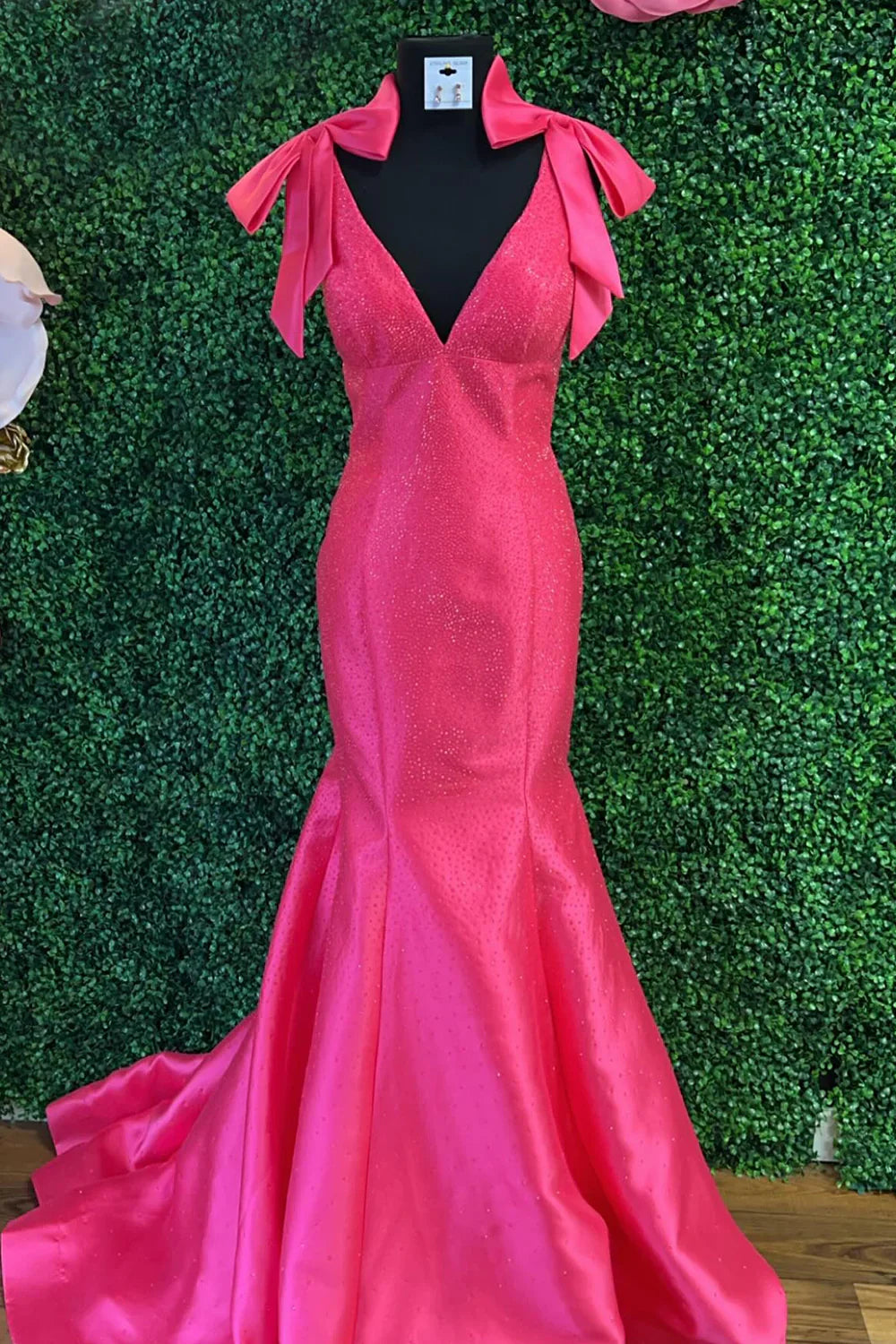 Full-length view of the yellow mermaid prom dress with V-neck and bowknot detail.