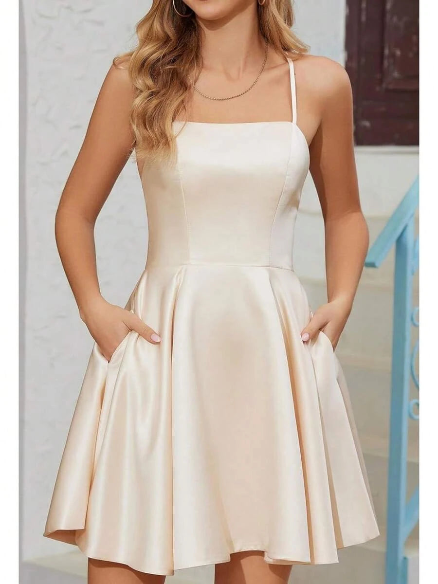 Elegant A-Line Spaghetti Straps Backless Pockets Satin Champagne Short Homecoming Dress