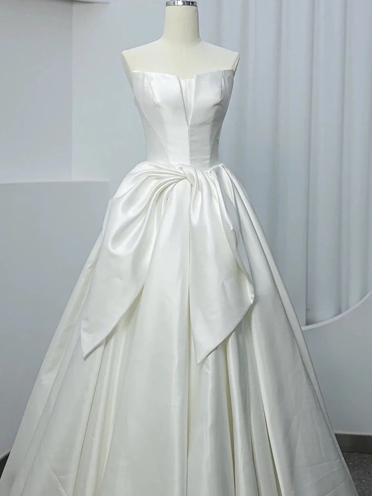 Elegant Ball Gown Strapless Bow-Accent Satin White Floor-Length Wedding Dress