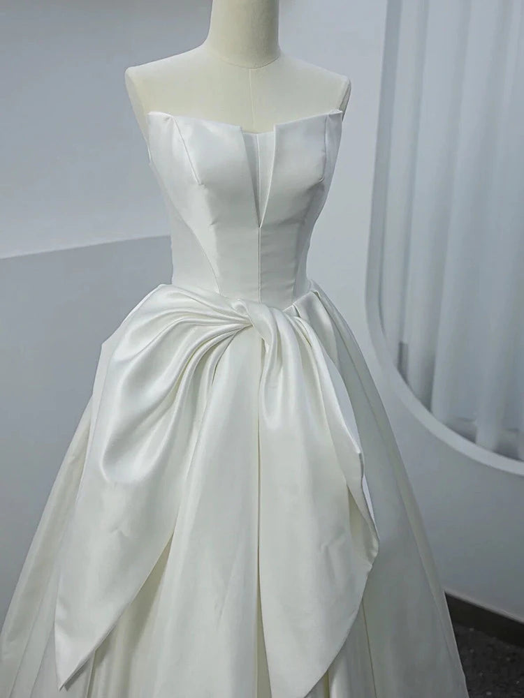 Elegant Ball Gown Strapless Bow-Accent Satin White Floor-Length Wedding Dress