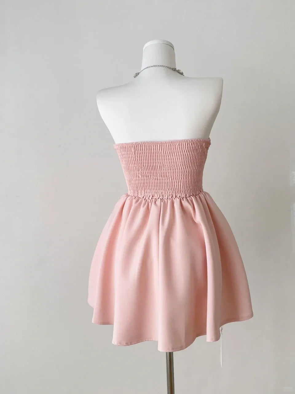 Lovely A-Line Strapless Smocked Satin Pink Short Homecoming Dress With Bow