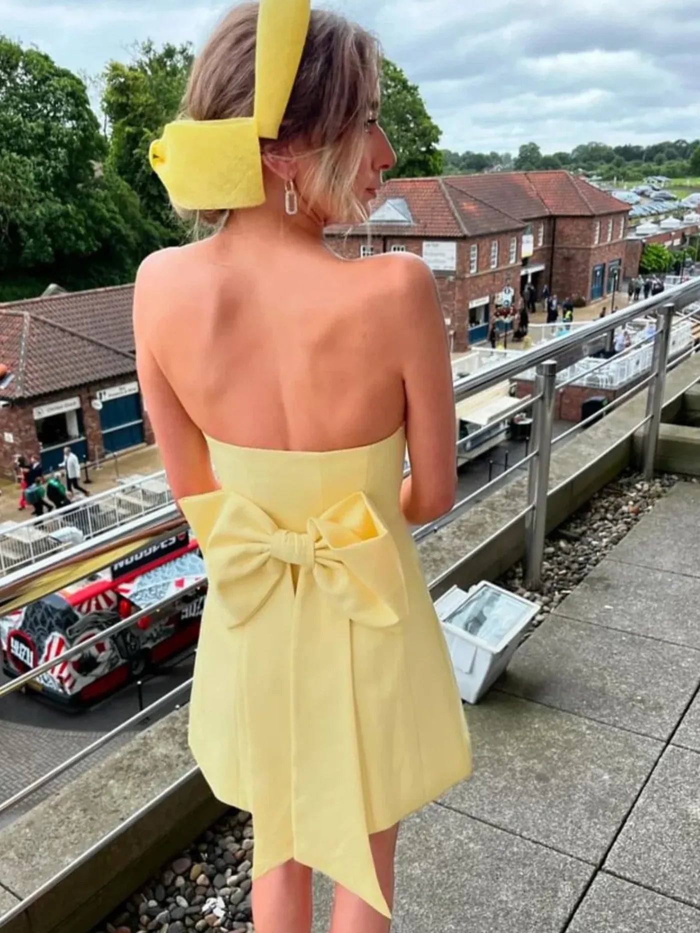 Pretty A-Line Strapless Satin Yellow Short Homecoming Dress With Bow Back