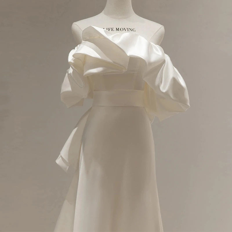 Stylish A-Line Off-Shoulder Ruffled Bow-Back Satin Ivory Floor Length Wedding Dress