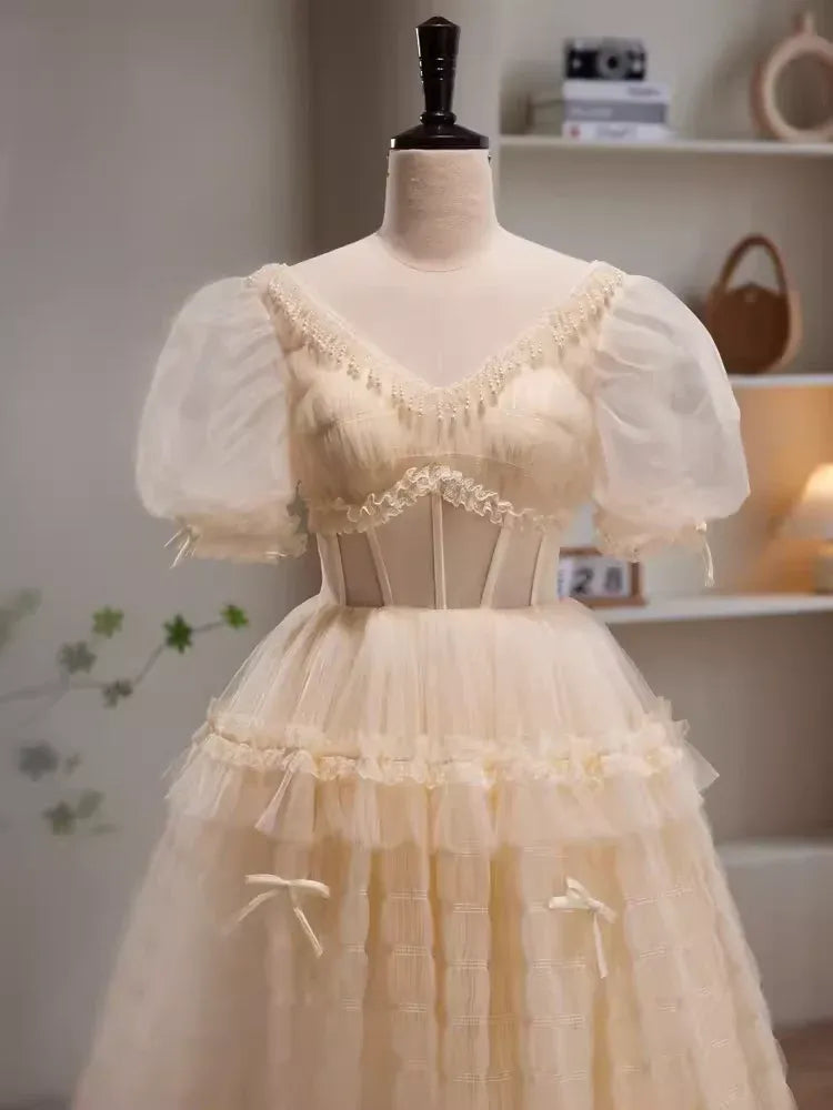 Whimsical A-Line Sweetheart Neck Puff Sleeve Bow Champagne Long Prom Dress For Women Custom