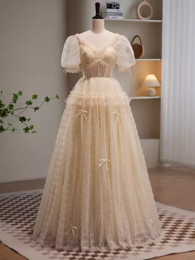 Whimsical A-Line Sweetheart Neck Puff Sleeve Bow Champagne Long Prom Dress For Women Custom