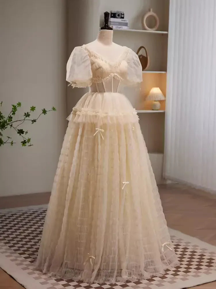 Whimsical A-Line Sweetheart Neck Puff Sleeve Bow Champagne Long Prom Dress For Women Custom
